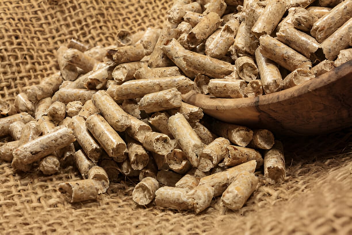 corn cob pellets on burlap fabric