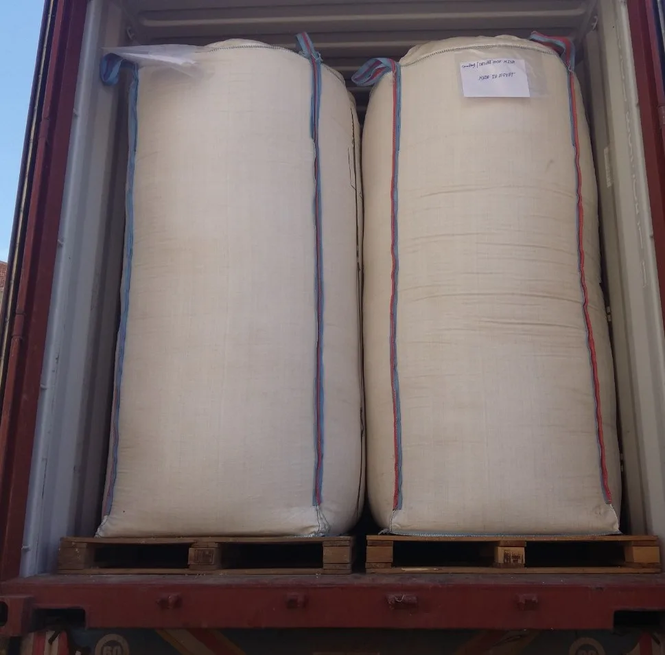 big bags of corn cob granules in container